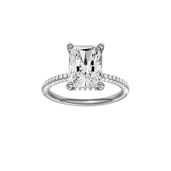 Radiant-cut diamond engagement ring with a pavé-set diamond band and hidden-halo setting.
