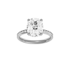 Elongated cushion-cut diamond engagement ring with a channel-set diamond band and hidden-halo setting.