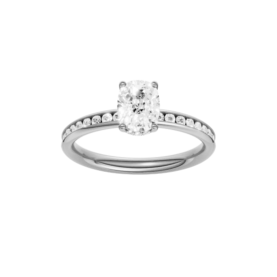 Elongated cushion-cut diamond engagement ring with a channel-set diamond band and hidden-halo setting.