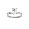 Elongated cushion-cut diamond engagement ring with a channel-set diamond band and hidden-halo setting.