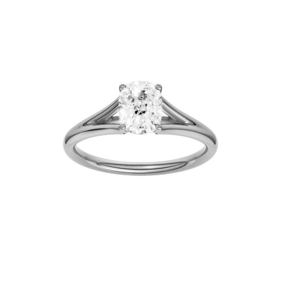 Elongated cushion-cut diamond engagement ring with a plain band and solitaire setting.