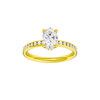 Oval-cut diamond engagement ring with a channel-set diamond band and hidden-halo setting.