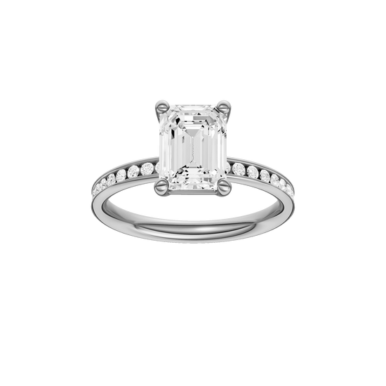 Emerald-cut diamond engagement ring with a channel-set diamond band and solitaire setting.
