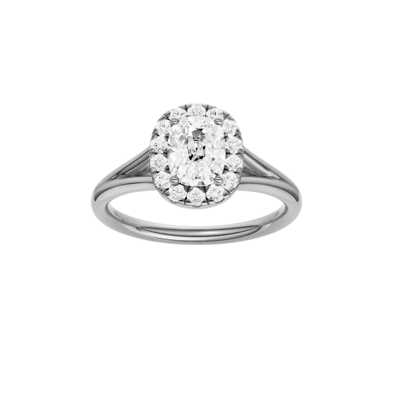 Elongated cushion-cut diamond engagement ring with a plain band and halo setting.