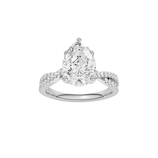 Pear-cut diamond engagement ring in 14k white gold with a prong-set diamond band and twist setting