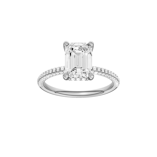 Emerald-cut diamond engagement ring with a pavé-set diamond band and hidden-halo setting.