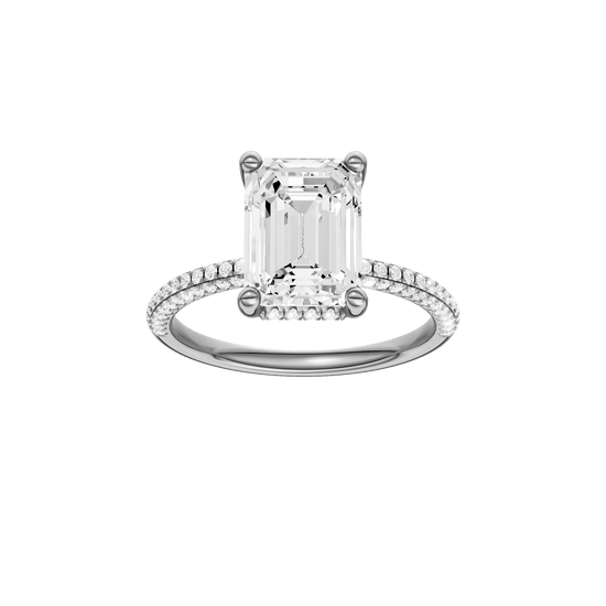 Emerald-cut diamond engagement ring with a pavé-set diamond band and hidden-halo setting.