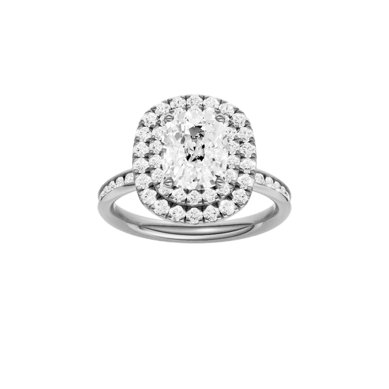 Elongated cushion-cut diamond engagement ring with a channel-set diamond band and double-halo setting.