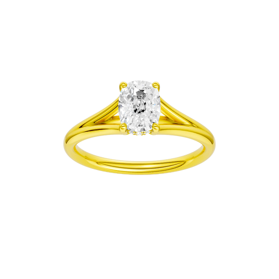 Elongated cushion-cut diamond engagement ring with a plain band and hidden-halo setting.