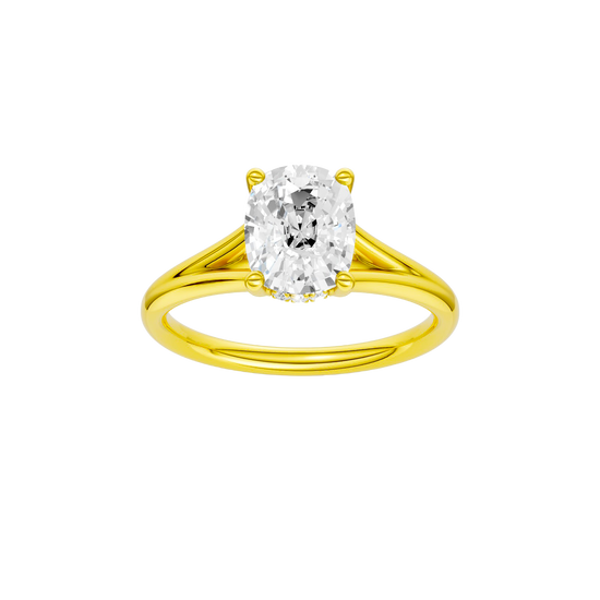 Elongated cushion-cut diamond engagement ring with a plain band and hidden-halo setting.