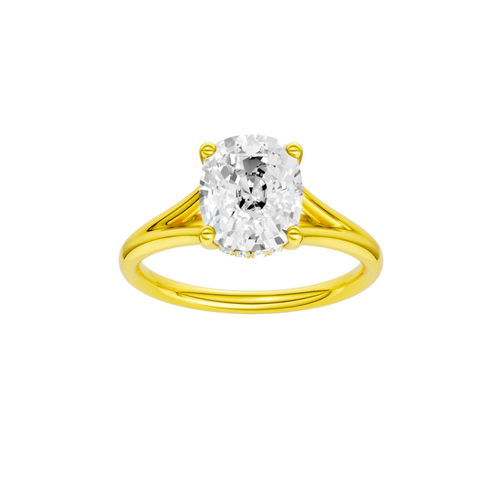 Elongated cushion-cut diamond engagement ring with a plain band and hidden-halo setting.