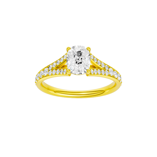 Elongated cushion-cut diamond engagement ring with a channel-set diamond band and solitaire setting.