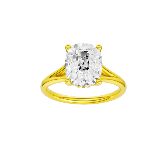 Elongated cushion-cut diamond engagement ring with a plain band and hidden-halo setting.