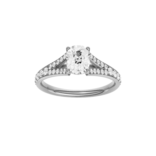 Elongated cushion-cut diamond engagement ring with a channel-set diamond band and solitaire setting.