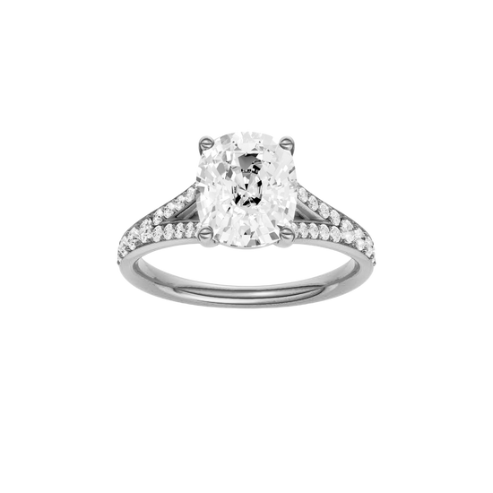 Elongated cushion-cut diamond engagement ring with a channel-set diamond band and solitaire setting.