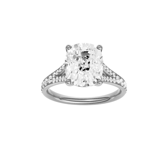 Elongated cushion-cut diamond engagement ring with a channel-set diamond band and solitaire setting.