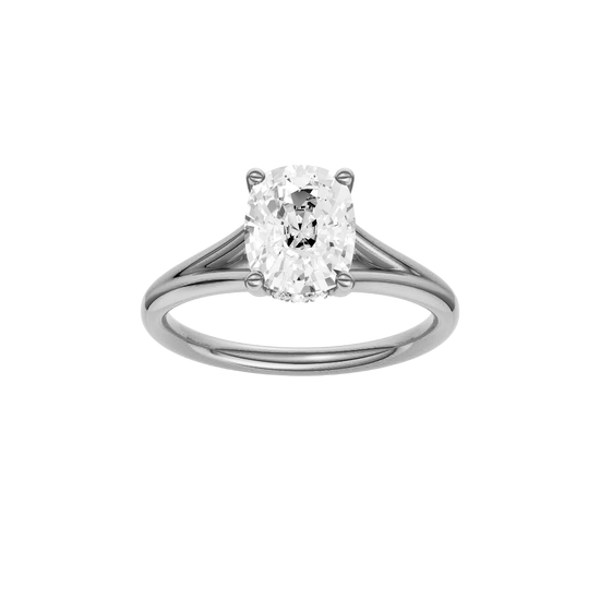 Elongated cushion-cut diamond engagement ring with a plain band and hidden-halo setting.