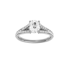 Elongated cushion-cut diamond engagement ring with a channel-set diamond band and solitaire setting.
