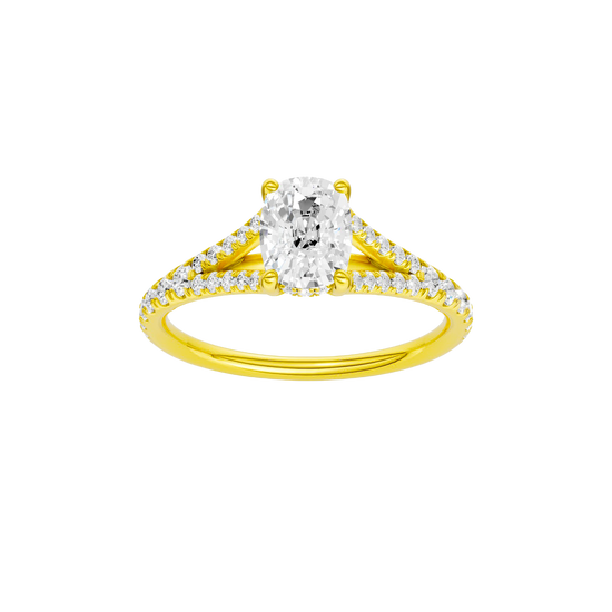 Elongated cushion-cut diamond engagement ring with a prong-set diamond band and hidden-halo setting.