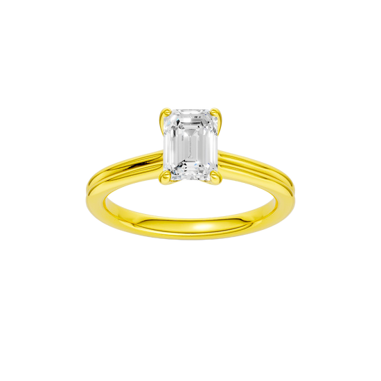 Emerald-cut diamond engagement ring with a plain band and solitaire setting.