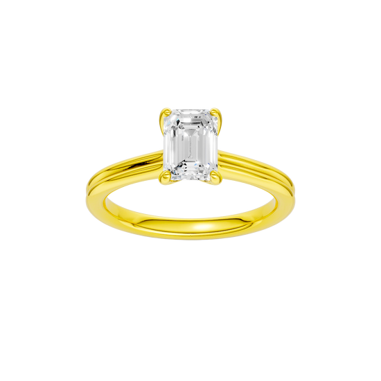 Emerald-cut diamond engagement ring with a plain band and solitaire setting.