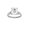 Elongated cushion-cut diamond engagement ring with a channel-set diamond band and solitaire setting.
