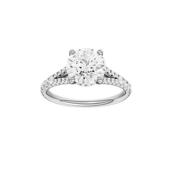 Round-cut diamond engagement ring with a prong-set diamond band and hidden-halo setting.
