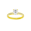 Elongated cushion-cut diamond engagement ring with a channel-set diamond band and solitaire setting.