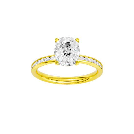 Elongated cushion-cut diamond engagement ring with a channel-set diamond band and solitaire setting.