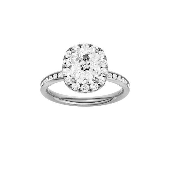 Elongated cushion-cut diamond engagement ring with a channel-set diamond band and halo setting.