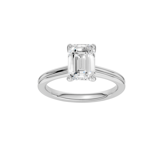 Emerald-cut diamond engagement ring with a plain band and solitaire setting.