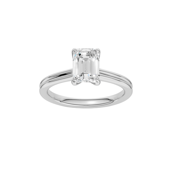 Emerald-cut diamond engagement ring with a plain band and solitaire setting.