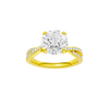 Round-cut diamond engagement ring in 14k yellow gold with a prong-set diamond band and twist setting
