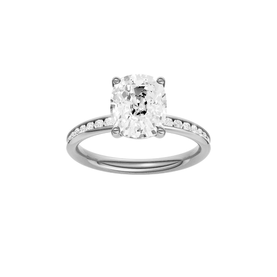 Elongated cushion-cut diamond engagement ring with a channel-set diamond band and solitaire setting.