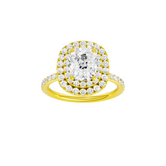 Elongated cushion-cut diamond engagement ring with a prong-set diamond band and double-halo setting.