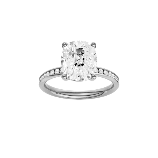 Elongated cushion-cut diamond engagement ring with a channel-set diamond band and solitaire setting.