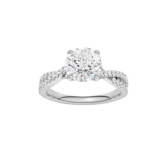 Round-cut diamond engagement ring in 14k white gold with a prong-set diamond band and twist setting