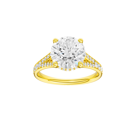 Round-cut diamond engagement ring with a channel-set diamond band and hidden-halo setting.