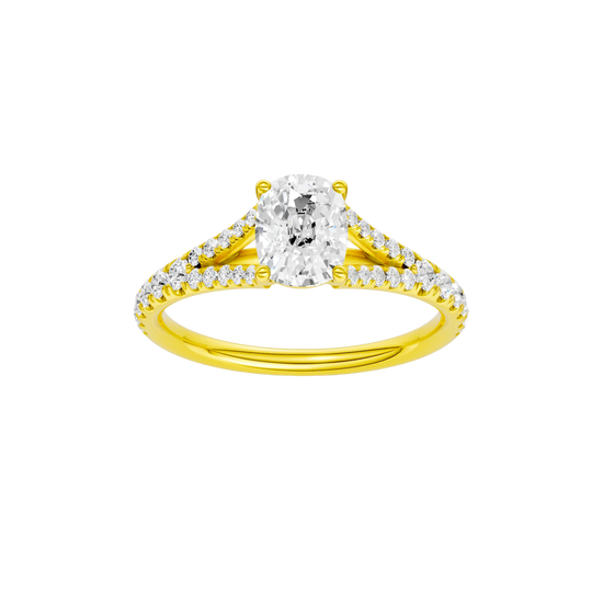Elongated cushion-cut diamond engagement ring with a prong-set diamond band and solitaire setting.