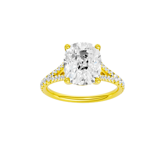 Elongated cushion-cut diamond engagement ring with a prong-set diamond band and solitaire setting.