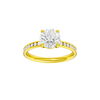 Round-cut diamond engagement ring with a channel-set diamond band and solitaire setting.
