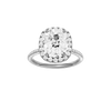Elongated cushion-cut diamond engagement ring with a pavé-set diamond band and halo setting.