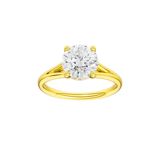 Round-cut diamond engagement ring with a plain band and hidden-halo setting.