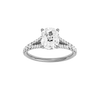 Elongated cushion-cut diamond engagement ring with a prong-set diamond band and solitaire setting.