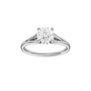 Round-cut diamond engagement ring with a plain band and hidden-halo setting.