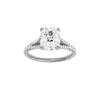 Elongated cushion-cut diamond engagement ring with a prong-set diamond band and solitaire setting.