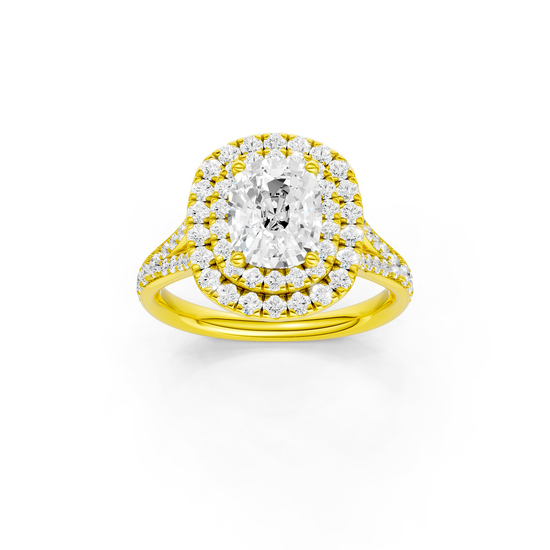 Elongated cushion-cut diamond engagement ring with a channel-set diamond band and double-halo setting.