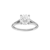 Round-cut diamond engagement ring with a plain band and hidden-halo setting.