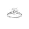 Round-cut diamond engagement ring with a plain band and hidden-halo setting.