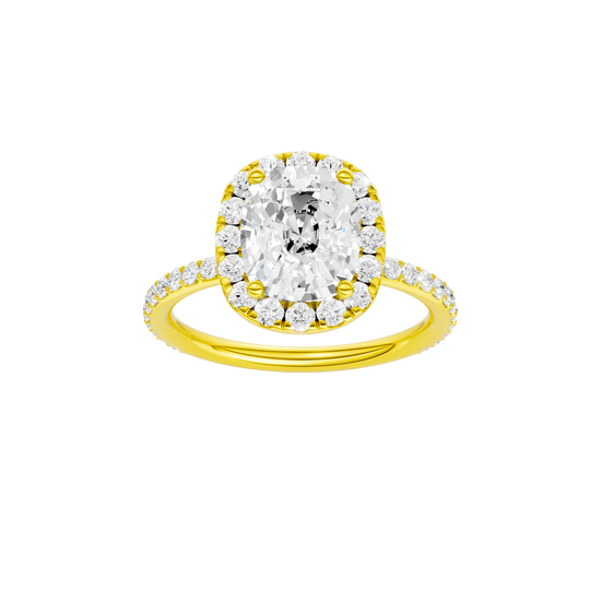 Elongated cushion-cut diamond engagement ring with a prong-set diamond band and halo setting.